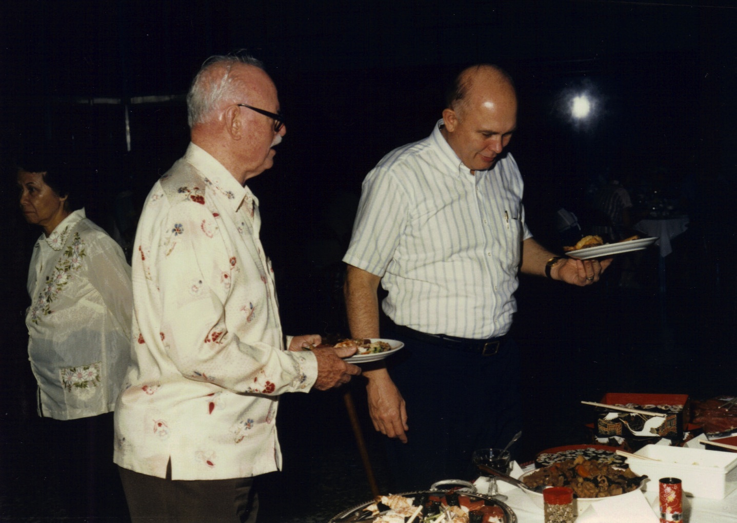 Elder Dallin Oaks and George Q. Cannon at Board of Directors dinner