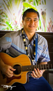 Manoa Playing Guitar